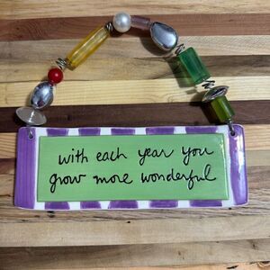 Department 56 purple and green wall hanger with beads